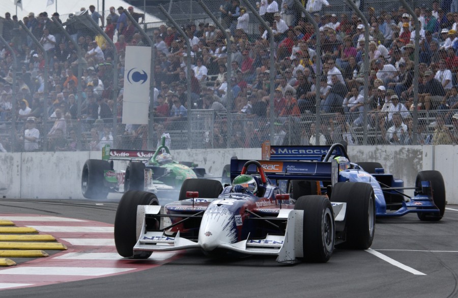 08/31/03 Denver, Co. Darren Manning battles with Alex Tagliani and Mario Dominguez during the Centrix Financial Grand Prix of Denver. Photo credit: Autostock